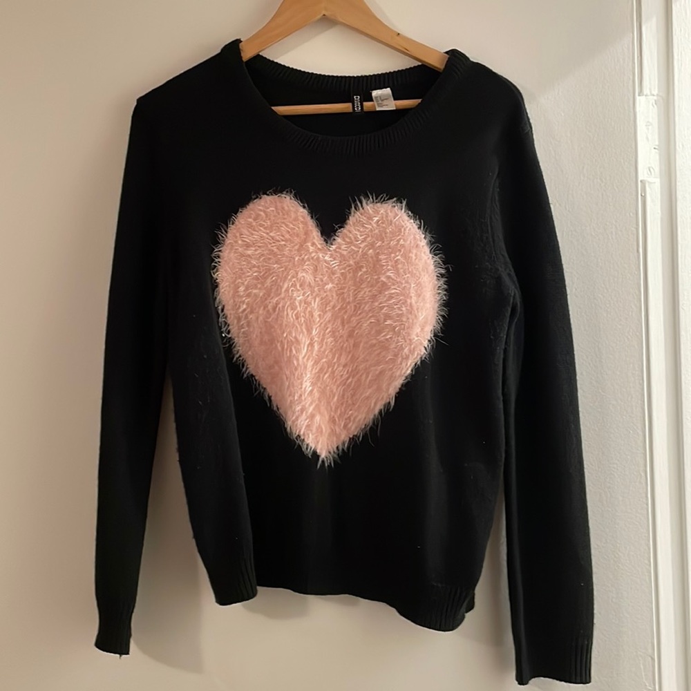 Black sweater with pink fluffy heart design